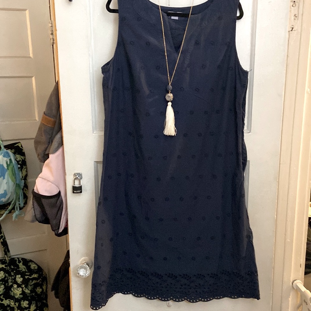 Navy blue cutaway dress with necklace